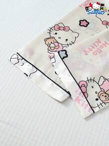 Sanrio 两件套女士春夏缎面三丽鸥Hello Kitty翻领长袖纽扣口袋上衣和蝴蝶结长裤睡衣套装，适合居家穿着，秋冬皆宜。