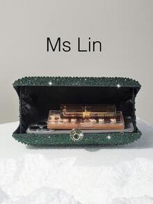 1 chiếc ví cầm tay màu xanh lá cây bóng bẩy, đính pha lê hai mặt, kèm dây đeo chéo bằng kim loại, thời trang và thanh lịch, phù hợp cho các dịp trang trọng, lý tưởng cho cô dâu. Phối hợp hoàn hảo với váy cưới, váy dạ hội, váy dự tiệc, váy sinh nhật, váy dự tiệc và váy tốt nghiệp. - Màu xanh lá cây đậm - Xem 5