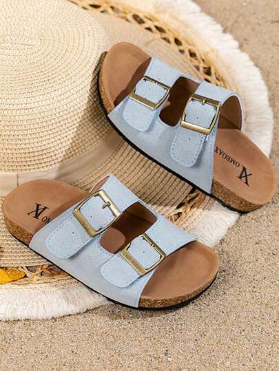 A Pair Of Best-Selling Children's /2025 New Girls' Flip-Flops, With A Light Blue Matte Upper And Golden Metal Buckles, Featuring A Simple And Fashionable Style. The Sole Part Is Made Of Cork Material, Which Increases Comfort. It Is Suitable For Girls Aged 3 To 12 To Wear In Various Occasions Such As Playing On The Beach And Daily Casual Wear. It Is A Fashionable And Casual Cool Drag Style For Girls.