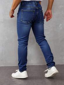 Pantalones vaqueros ajustados para hombre de color azul, tela transpirable y cómoda, ideales para estilos casuales urbanos - Azul lavado medio - Ver 2
