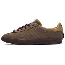 Adidas Originals Zapatillas de deporte de caña baja GAZELLE INDOOR, zapatos cómodos y casuales para ir y venir, clásicos tenis de exterior para deportes y ocio con cordones JQ8725 - Capa de roca tierra profunda marrón/amarillo oscuro/amarillo resina - Ver 1