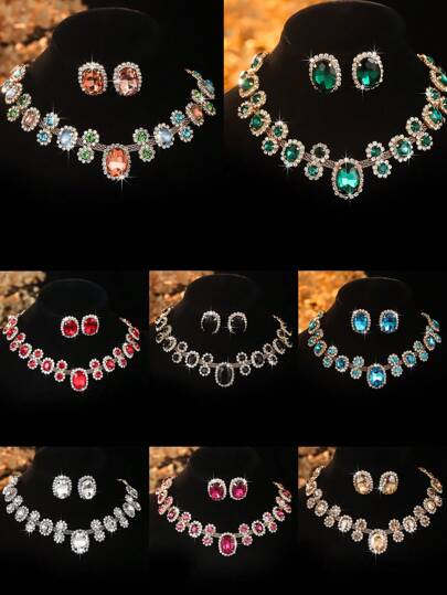 قلادة نسائية أنيقة بتصميم هندسي بيضاوي باللون الأحمر والأخضر والأبيض مزينة بالأزهار والكريستال، زوج من أقراط هندسية بيضاوية متناسقة باللون الأحمر والأخضر والأبيض مزينة بالأزهار والكريستال، طقم مكون من قطعتين مناسب للسهرات والاستخدام اليومي