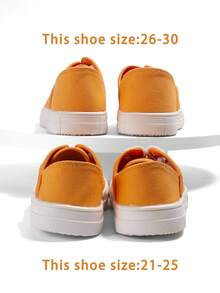 1 双橙色帆布系带平底时尚活泼校园风格舒适透气休闲运动鞋，适合学生日常户外活动（随机）