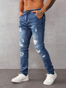 Pantalones vaqueros ajustados para hombre de color azul claro con detalles de roturas y pinturas, estilo casual y artístico - Lavado ligero - Ver 2