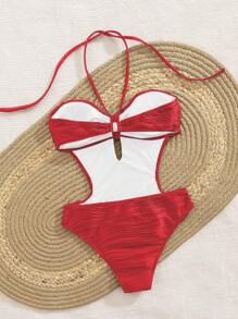 Costume da bagno intero da donna alla moda con taglio sulla vita e scollo a canottiera