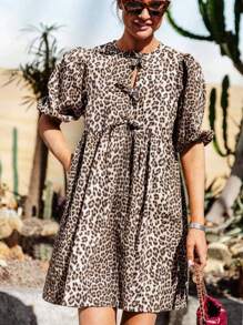 Elegant Plus-Size Lady's Short-Sleeved Dress With A Leopard Pattern, A Small Round Neck, And A Front Tie