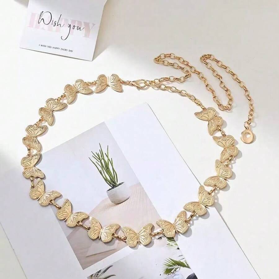 A New Style Metal Butterfly Ornament Waist Chain, A Gold Waist Belt, The Gold Waist Chain Can Be Paired With Skirts And Dresses, A Fitted Chain-Decorated Waist Belt That Accentuates The Waistline, Featuring A Butterfly Bohemian Zinc Alloy Geometric Pattern, Suitable For Weddings, Parties, Sports, A Uniquely Slender Women's Waist Chain, Suitable For Spring, Summer, Autumn, And Winter.