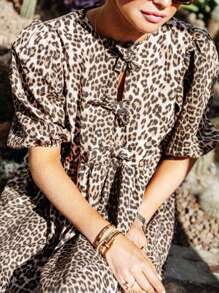 Elegant Plus-Size Lady's Short-Sleeved Dress With A Leopard Pattern, A Small Round Neck, And A Front Tie