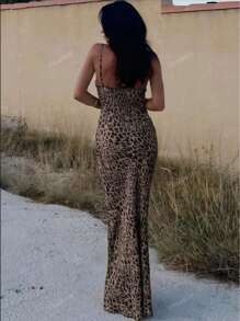 Vestito a tubino con pizzo traforato e stampa leopardata