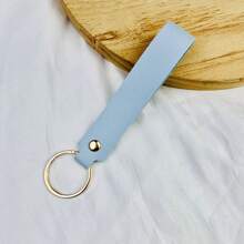 Individuelle Lasergravierte, vielseitige Leder-Schlüsselanhänger in einfarbig, Handgelenkriemen, Taschenbaumler, Figuren-Schlüsselband, modischer Paare/Auto Schlüsselanhänger Accessoire