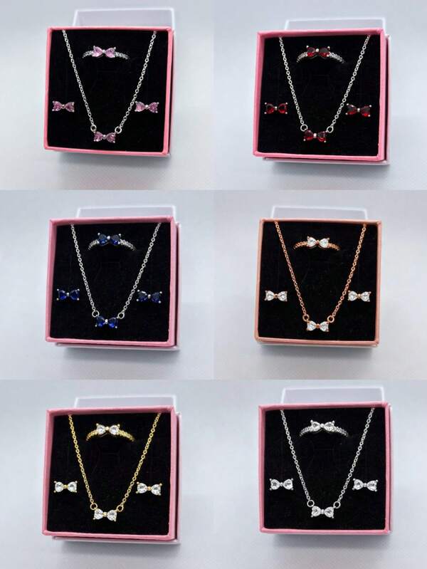 Parure de bijoux originale 2025, 3 pièces, multicolore, avec nœud, composée d'1 paire de boucles d'oreilles, d'une bague et d'un collier en argent hypoallergéniques. Ornée de diamants taille brillant et d'un nœud rouge vif, elle est ornée de diamants en forme de cœur, simples et élégants. Parfaite pour les anniversaires, les cadeaux, les fêtes et au quotidien. Offre limitée dans le temps.