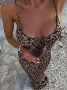 Vestito a tubino con pizzo traforato e stampa leopardata