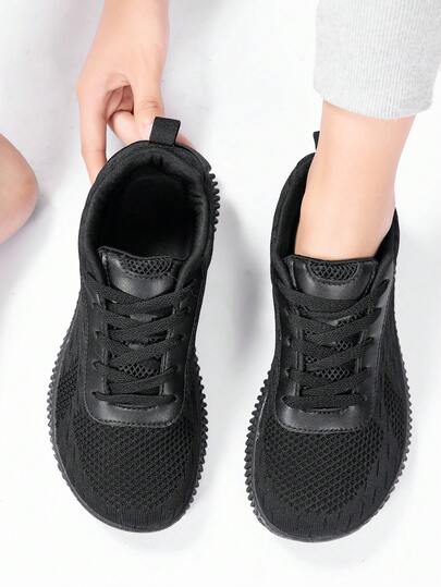 TOLLN زوج من أحذية النساء الرياضية الكاجوال ذات لون واحد ومصنوعة من المحبوك، ذات تناسق واسع لأغراض رياضية وارتداء يومي، مناسبة للربيع والصيف