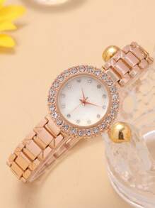 1 pieza Reloj de mujer con cara de diamante redonda, elegante y de moda. Correa de cadena de aleación versátil de acero. Reloj de cuarzo adecuado para fiestas, bodas y uso diario, el mejor conjunto de regalo para mujeres.