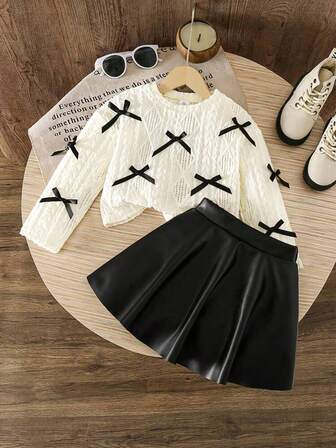 2pcs/Set Girls' Solid Color Bow Hollow Long Sleeve Top And Black PU Leather Skirt Set, Sweet Vacation Cute Fashion Knit Top And Mini Skirt Outfit, Suitable For Outdoor, Party, Gift, Spring/Autumn