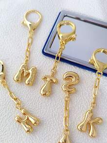 A Fashionable Bubble-Shaped Keychain Pendant In The Shape Of A Balloon, Equipped With Luggage Hooks Labeled With The 26 English Letters From A To Z.
