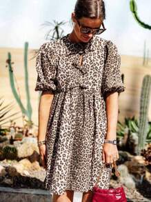 Elegant Plus-Size Lady's Short-Sleeved Dress With A Leopard Pattern, A Small Round Neck, And A Front Tie