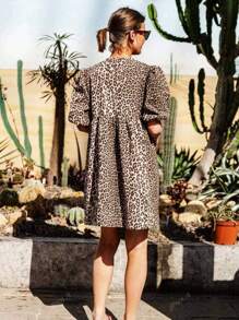 Elegant Plus-Size Lady's Short-Sleeved Dress With A Leopard Pattern, A Small Round Neck, And A Front Tie