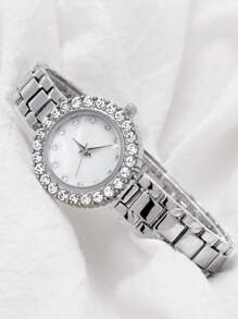 1 pieza Reloj de mujer con cara de diamante redonda, elegante y de moda. Correa de cadena de aleación versátil de acero. Reloj de cuarzo adecuado para fiestas, bodas y uso diario, el mejor conjunto de regalo para mujeres.