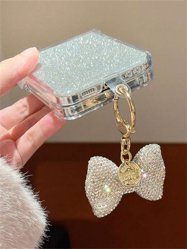 Funda plegable para teléfono con brillo de lentejuelas plateadas de lujo, con colgante de lazo de cristales brillantes, compatible con Samsung Galaxy Z Flip 6 5 4 3, funda trasera dura de PC transparente, estilo coreano INS