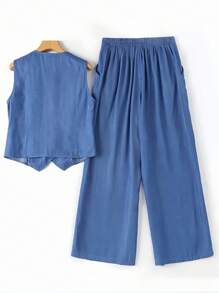 Conjunto de duas peças casual e minimalista de férias, composto por um colete sem mangas com decote em V, bolso falso, bainha assimétrica e uma calça de perna larga