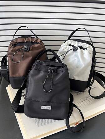 时尚休闲大容量尼龙抽绳水桶包，单肩斜挎包，适合户外运动徒步旅行