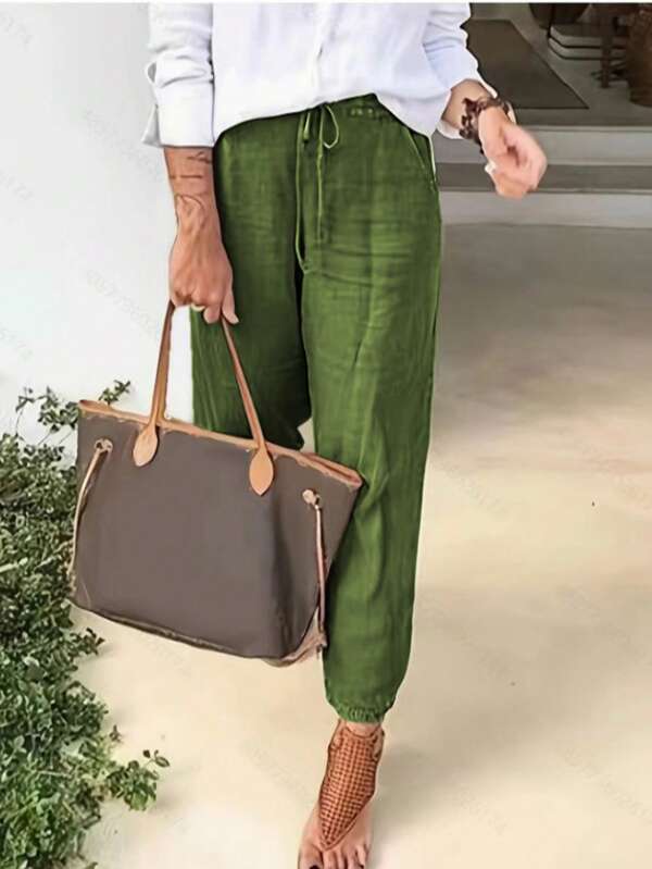 Pantalones casuales entallados para mujer con cintura elástica y bolsillos laterales - Tela ligera y transpirable adecuada para primavera, verano y otoño, uso versátil, ajuste relajado, prendas inferiores de moda, diseño práctico, material suave, para mujeres adultas