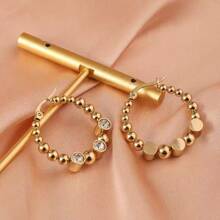Boucles d'oreilles en acier inoxydable européennes et américaines, boucles d'oreilles de mode haut de gamme décorées de strass plaquées or 18 carats