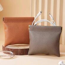 2025秋冬畅销促销荔枝纹自动闭合数据线耳机收纳袋，迷你便携数码包，带按扣