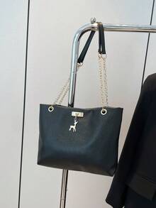 1个涤纶鹿图案装饰大容量拉链单肩手提包，适合女性日常使用