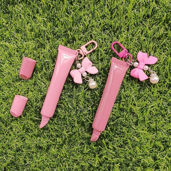 1 pieza 15ML Tubos de bálsamo de labios rosa con llavero con colgante de estrella, tubos de crema destacada y contorno