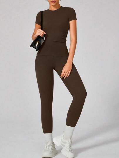 2pcs/Set Women Plus Size Fashion High Waist Flattering Soft Skin-Friendly Round Neck Short Sleeve Top And Elastic Yoga, Pilates Workout Pants