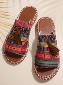 Sandalias planas sin cordones para mujer, de paja trenzada, con suela blanda, puntera abierta y borlas, estilo bohemio para la playa