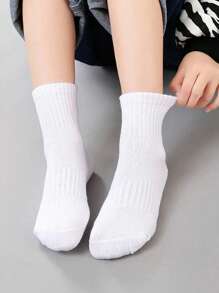 5 pares de calcetines tipo crew para niños y niñas, de unicolor negro/blanco/gris, para todas las temporadas, versátiles para deportes