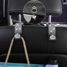Bộ 4 món hình vương miện đính đá lấp lánh - Móc treo đồ trên xe hơi, bao gồm 2 móc treo đồ phía sau ghế xe, 1 móc treo tựa đầu lấp lánh và 2 móc dán mini, thiết kế sang trọng và sáng tạo. - Hoa văn vương miện - Xem 6