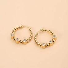 Boucles d'oreilles en acier inoxydable européennes et américaines, boucles d'oreilles de mode haut de gamme décorées de strass plaquées or 18 carats