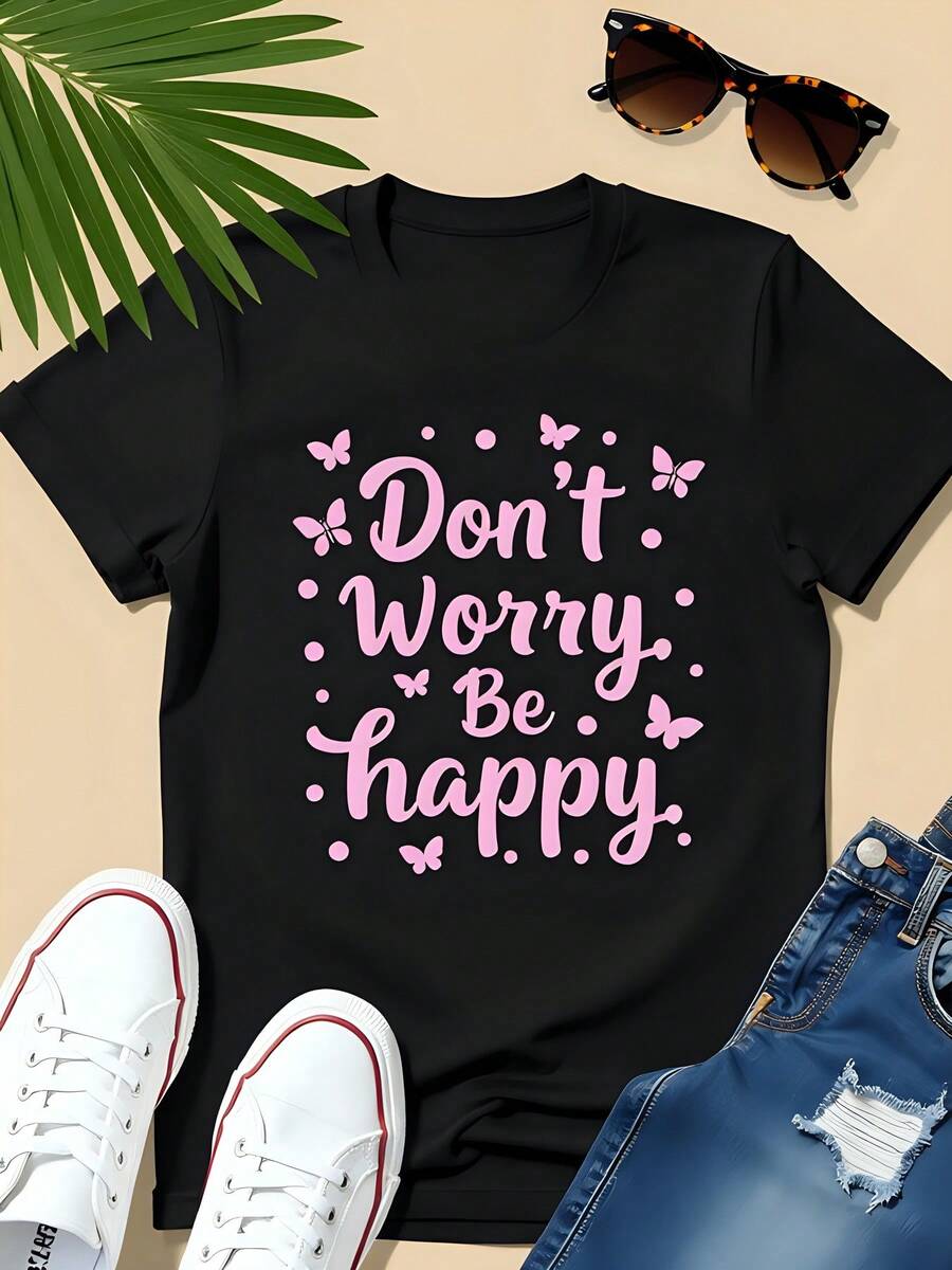 Camiseta estampada "No te preocupes, sé feliz" en algodón negro de 180 g, camiseta de manga corta con cuello redondo para mujer, camiseta con gráfico de mariposa, atuendo inspirador, ropa informal de verano ideal para regalos de Acción de Gracias o Navidad, tallas grandes para mujer - Negro - Ver 1