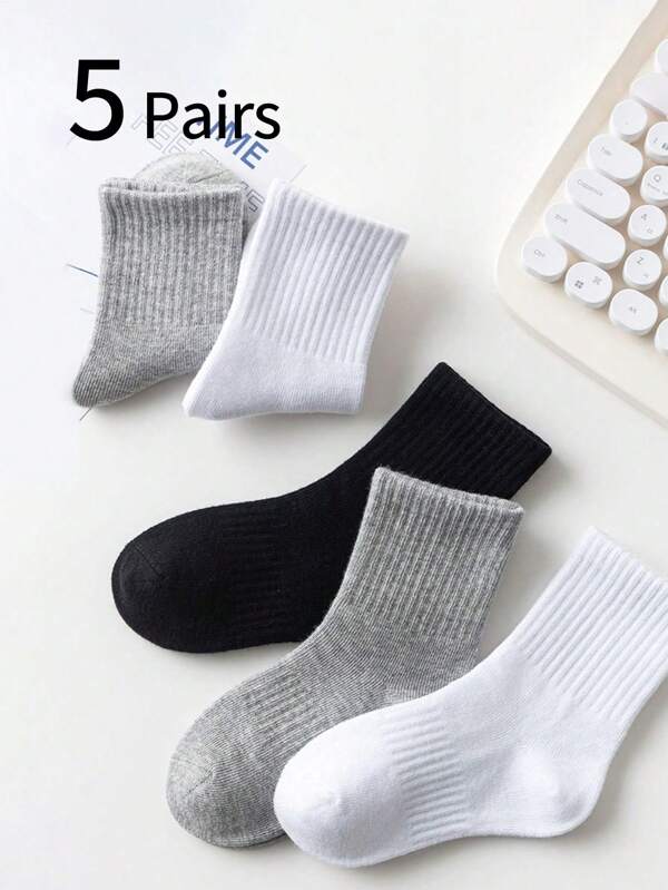 5 pares de calcetines tipo crew para niños y niñas, de unicolor negro/blanco/gris, para todas las temporadas, versátiles para deportes