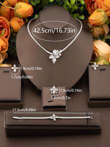 1 Bộ trang sức thiết kế hình lá Cubic Zirconia sang trọng, bao gồm 1 đôi hoa tai, 1 vòng cổ, 1 vòng tay, 1 nhẫn, thích hợp để đeo trong tiệc cưới (Không bao gồm hộp quà) - Bạc 03 - Xem 5