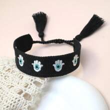 1 pièce Bracelet ajustable vintage tressé à la main avec un œil de démon créatif, à franges. Convient pour la famille, les amis, les étudiants, les cadeaux de fête, les fêtes, les voyages, bracelet de bénédiction