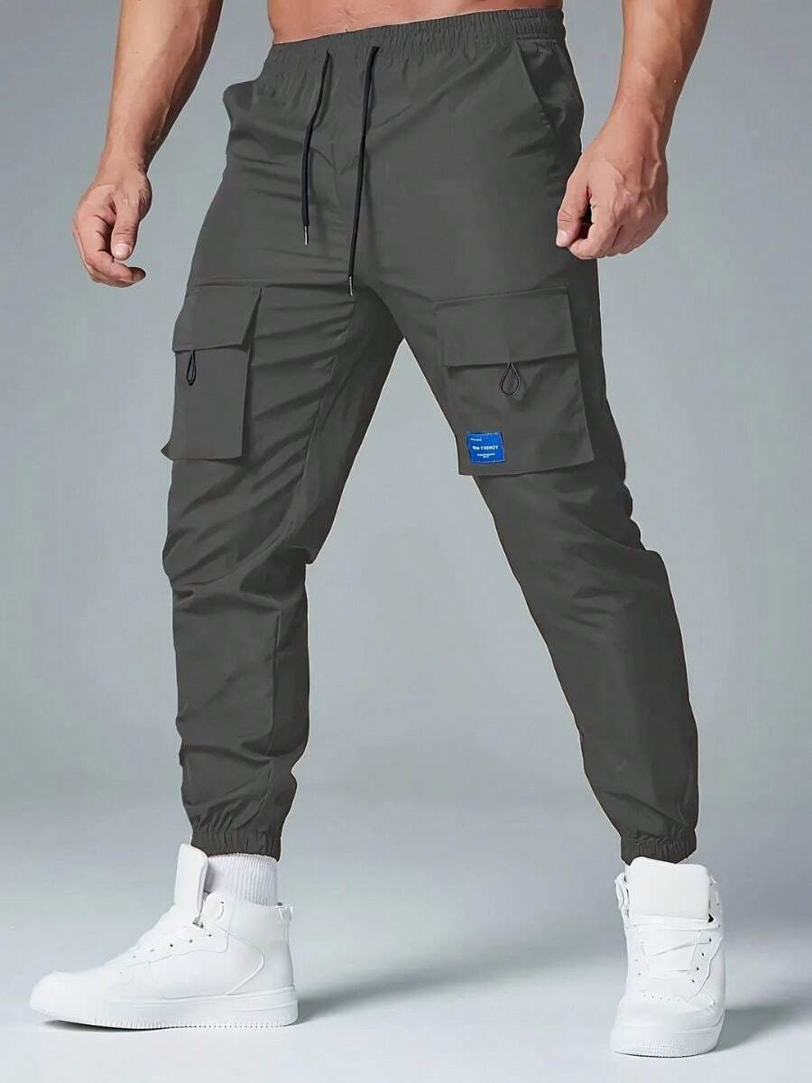 Pantalones casuales multibolsillos con cordón en color sólido para hombre - Gris - Ver 1