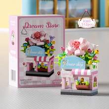 一套创意街景积木，包含一家花店、一家奶茶店、一家咖啡店、一家汉堡店、一家炸鸡店和一家蛋糕店。适合用作桌面装饰和可爱摆件。生日礼物、万圣节礼物、圣诞节礼物、派对礼物、女孩玩具、可爱玩具。