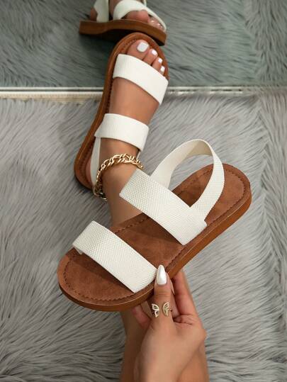 Kate Miuch صنادل وأحذية صيفية للنساء بتصميم كوري عصري "بخمسين قطعة" على طراز ال- "INS"، صنادل شاطئية صيفية ، صنادل نسائية بفتحة أمامية مفتوحة وأربطة مسطحة