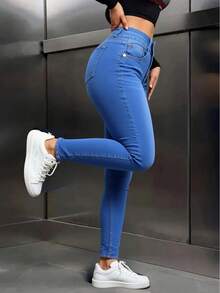 Pantalones vaqueros azules ajustados de tiro alto con doble botonadura, elásticos con bajo deshilachado, casuales y versátiles - Azul lavado medio - Ver 1