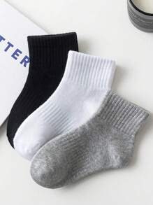 5 pares de calcetines tipo crew para niños y niñas, de unicolor negro/blanco/gris, para todas las temporadas, versátiles para deportes