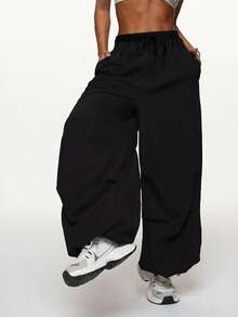 Spodnie sportowe Cargo z szerokimi nogawkami - Regulowane ściągacze przy kostce - Spodnie dresowe Streetwear Utility dla kobiet Rajstopy - Czarne - Zobacz 1