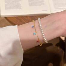 1 pièce Bracelet trèfle à quatre feuilles plaqué or 18 carats de couleur dopamine, design serti de zirconium, élégant et polyvalent. Convient aux femmes, pour les rendez-vous, les soirées, les cadeaux pour l'anniversaire de la petite amie/meilleure amie