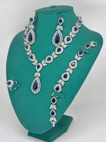 4 pièces Ensemble de bijoux de luxe pour femmes comprenant un collier, des boucles d'oreilles, une bague et un bracelet avec zirconium cubique vert. Convient pour les événements formels, les mariages, les mariées et les vacances. Coffret cadeau exquis