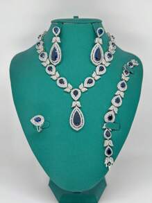 4 pièces Ensemble de bijoux de luxe pour femmes comprenant un collier, des boucles d'oreilles, une bague et un bracelet avec zirconium cubique vert. Convient pour les événements formels, les mariages, les mariées et les vacances. Coffret cadeau exquis