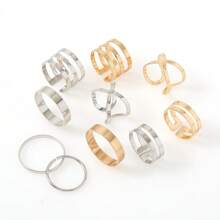 Set de 10 anillos de metal con junturas geométricas clásicas, en color dorado y plateado